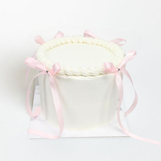 White Cake with PInk Bows